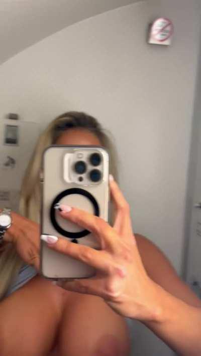 Some of the best tits you'll see flashing on a plane