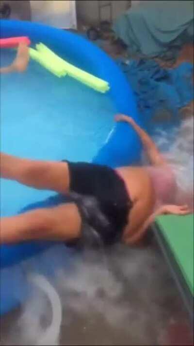 WCGW jumping into an inflatable pool