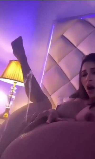 Sexy Latina pissing in her bed