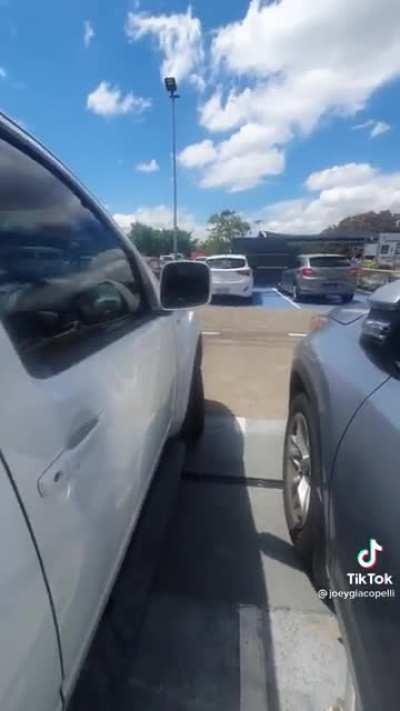 Fat Man thinks its okay to ruin someone's car although it's in the lines
