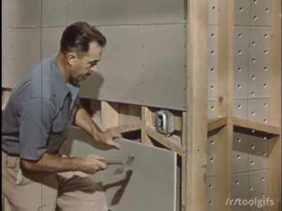 Hatchet blade used by a tradesman to score gypsum lath