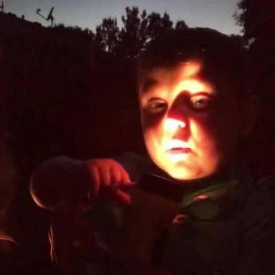 3 year old nephew telling a “ghost story” around the campfire