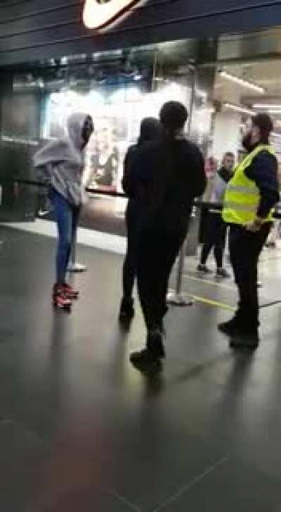 These 3 African women were stealing shoes from a nike store. When security caught them they threw dirt in his face and started screaming 