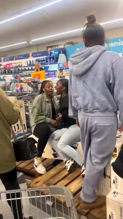 Shoppers fight over a Pilates machine inside an Aldi store in the UK.