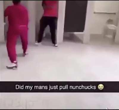 Guy pulls out nunchucks during fight