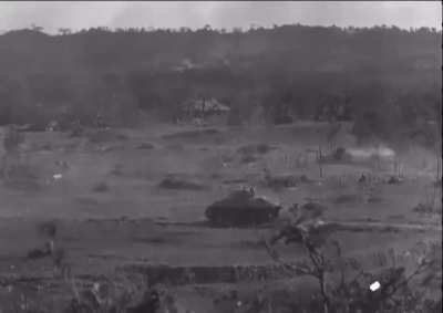 USMC Sherman tank under enemy fire on Okinawa 1945
