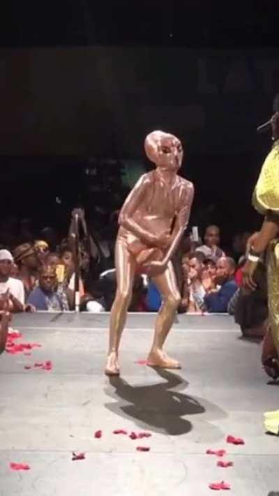 Alien birth at some fashion show