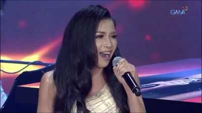 A contestant on a televised singing competition in my country, you can see the faces of the hosts just drop