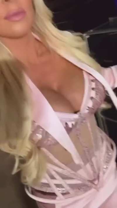 Maryse showing off her sexy figure in a tight outfit