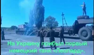 RU POV. Ukranain driver tries to load his mobile artillery piece onto the back of a truck with the help of military colleagues... but manages to flip it onto its back in the process (Archival Footage)