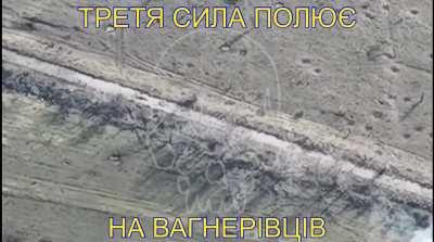 video from the Ukrainian Third force showing them target 2 wagner mercenary with an ATGM missile with one of them being hit directly. [music from source]