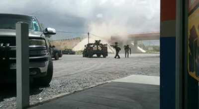 Holy shit war zone type of feeling here. This was in Tamaulipas Mexico. Mexican military against sicarios