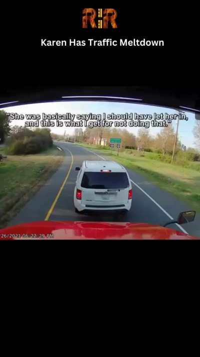 Driver blocking a truck because they previously wouldn't let them in.
