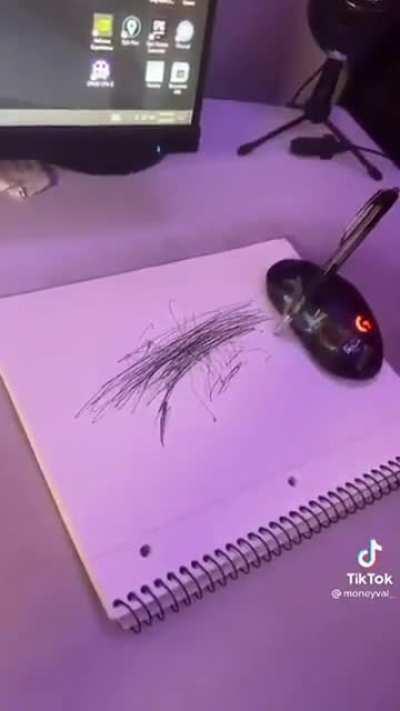 Taping a pen to mouse to trace its movement. 