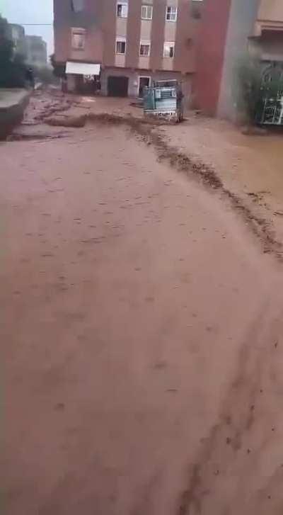 Trying to walk into torrential flood