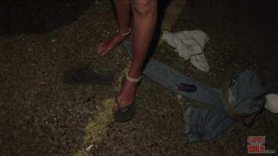 Embarrassed blonde hottie stripping her clothes off!