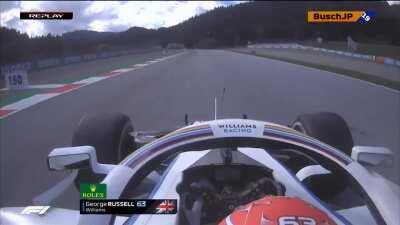 Grosjean with brake problems, overshoots turn 4