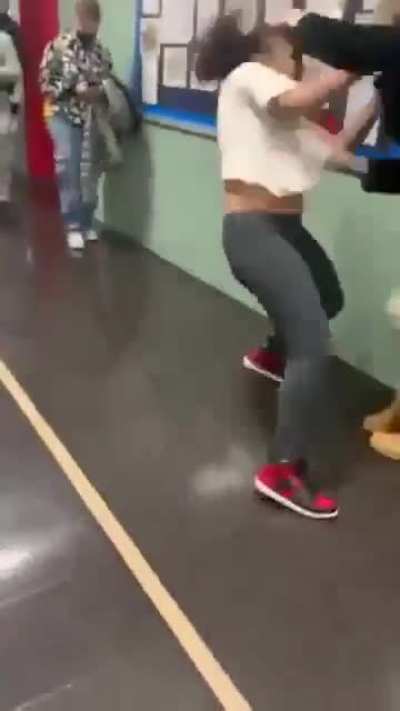 Girl gets beat up after attempting to stab student with pen.