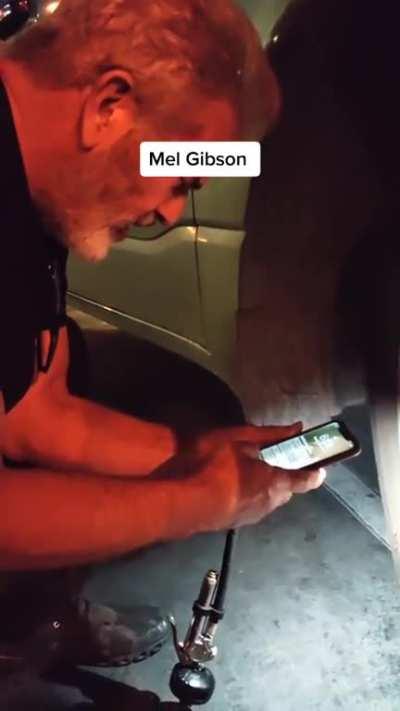 Mel Gibson trying to be nice towards an annoying fan