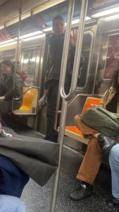 Man on subway screaming the N word Please be advised, the following video contains explicit language, including harsh slurs and references to sexual assault.