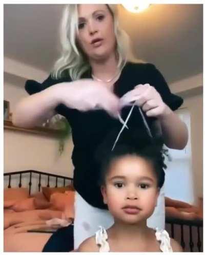 Mom took hairdressing classes to style daughters hair.