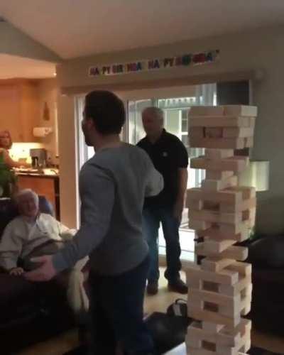 Jenga player makes the ultimate move