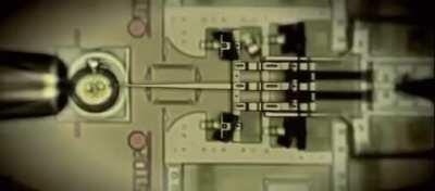 Nano Injector injecting DNA into a cell