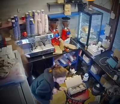 Missiles impact very close to a coffee shop