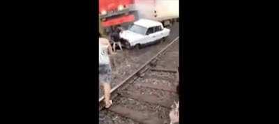 Drunk woman got car stuck on train tracks