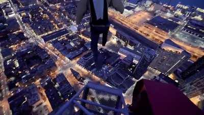 Urban daredevils parachute off of Toronto skyscrapers