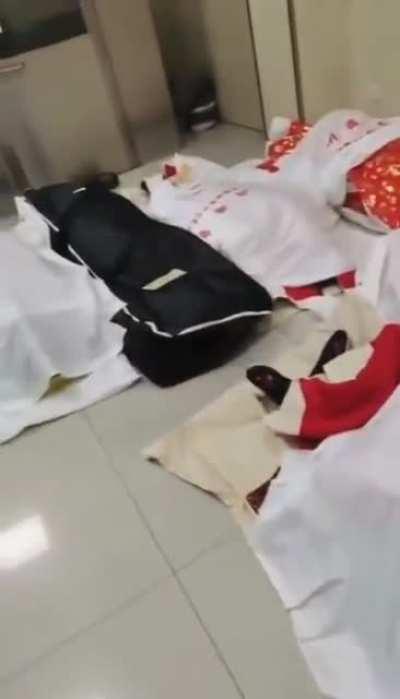 Funeral home in China overflowing with bodies