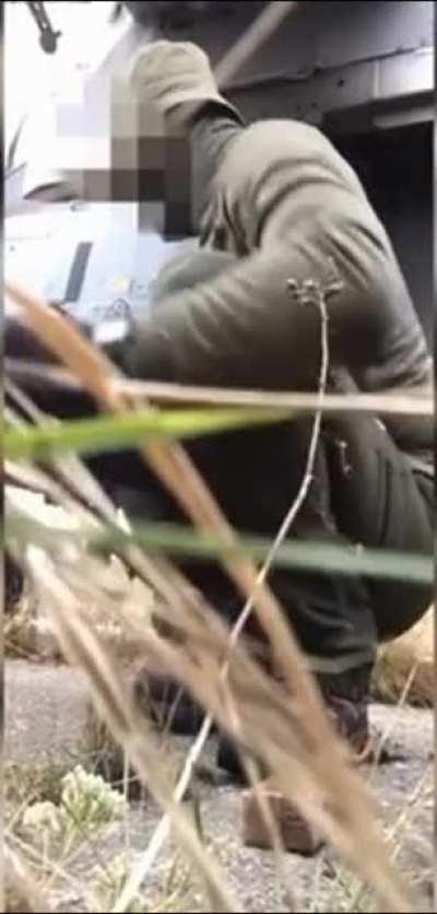 A Russian saboteur planting an explosive on a Russian KA-52 at an airfield in the Pskov region on October 31st. The explosion destroyed the KA-52 and a Mi-28.