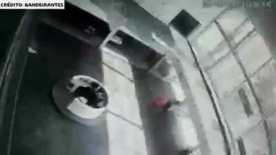 Car driven by unlicensed person falls nearly 20 feet and lands on 2 receptionists who were at the desk (they both survived)