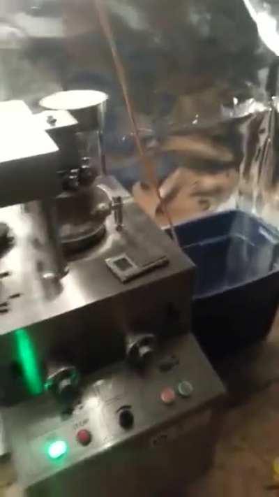 Darknet drug dealers working in a Xanax factory