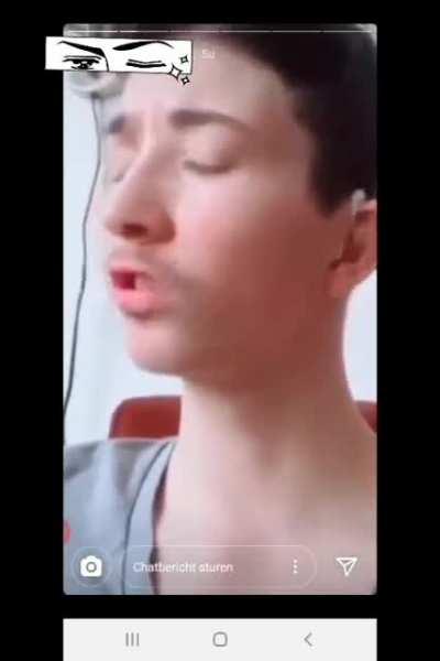 Dude pretending to be kissed by his non-existant girlfriend