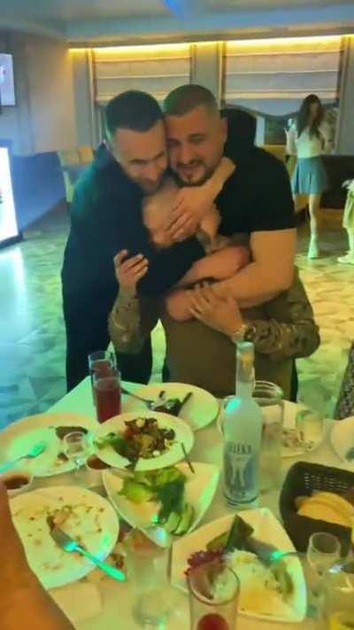 A group of friends celebrate that their childhood friend has returned home from Bakhmut for a few weeks of rest before being sent back to the frontlines again. They hug him, shed some tears and sing along with the famous “Fortress Bakhmut song”🇺🇦