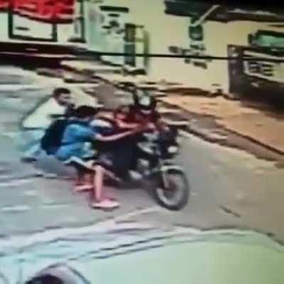 Guy tries to rob some people, gets what he deserves.