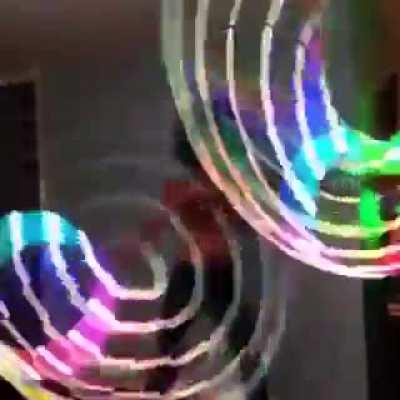 This woman and her two LED hula hoops.