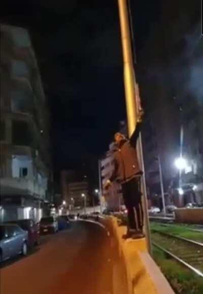 Holding a lit firework by my face