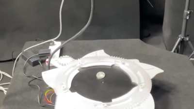 built a machine to flip a coin. that’s all it does.