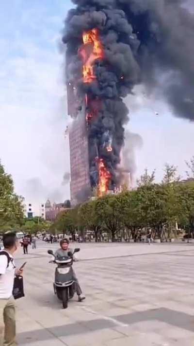 42 story building burning in Shanghai