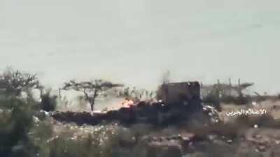 Coalition soldier catch fire after being shot at by an Houthi sniper