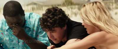 Kelly Rohrbach helps a guy who gets his cock and balls stuck while numerous girls watch in Baywatch 2017