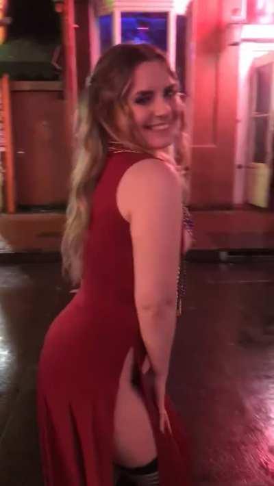 Beautiful woman showing her tits and pussy on the street