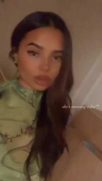 She’s wearing color