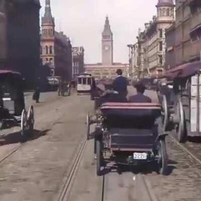 This hundred year old footage of a street car moving through a crowded city. San Fran prequake 1906