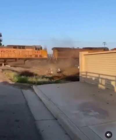 Car hauler demolition by way of train