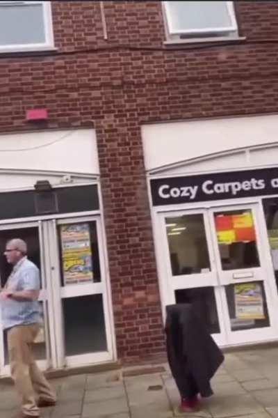 Traffic Warden interrupts high-street nature documentary