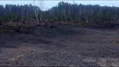 A crater from the explosion of a russian missile that was shot down in Kyiv region