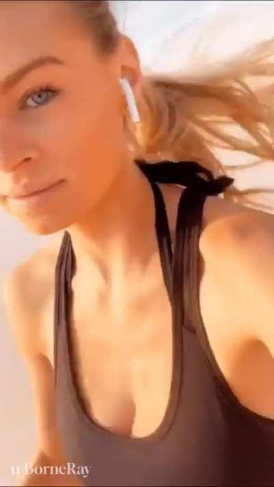 Jogging on the beach bouncing in a sports bra 🖤